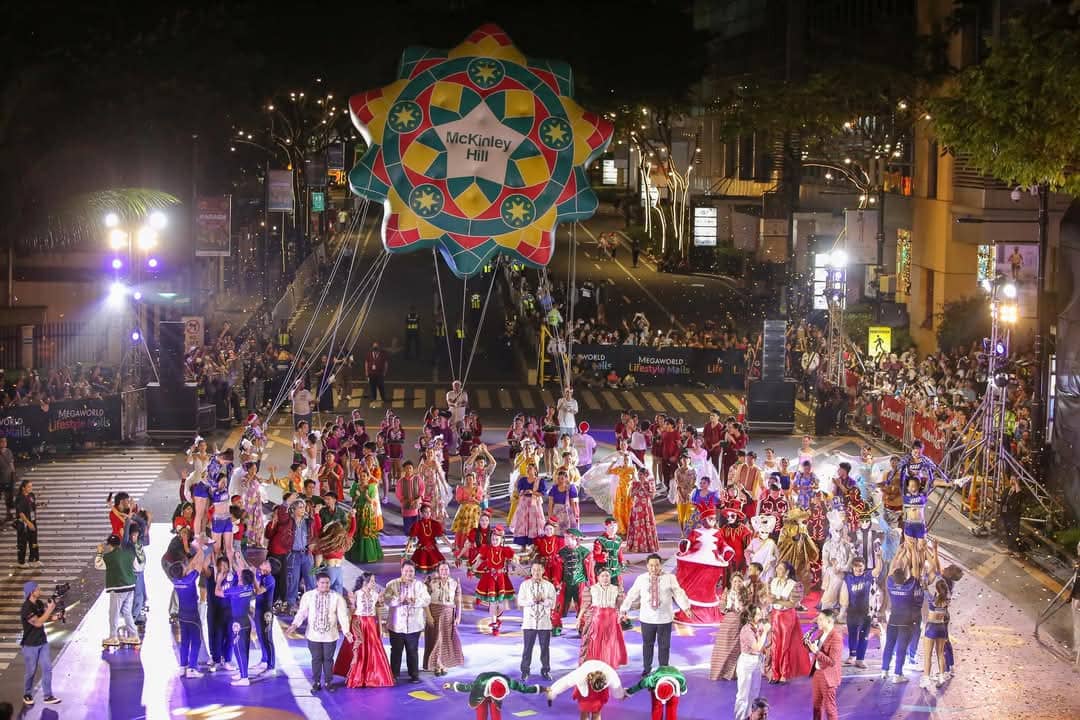 with over 15 larger-than-life floats and towering 25-foot character balloons made their way through the streets.