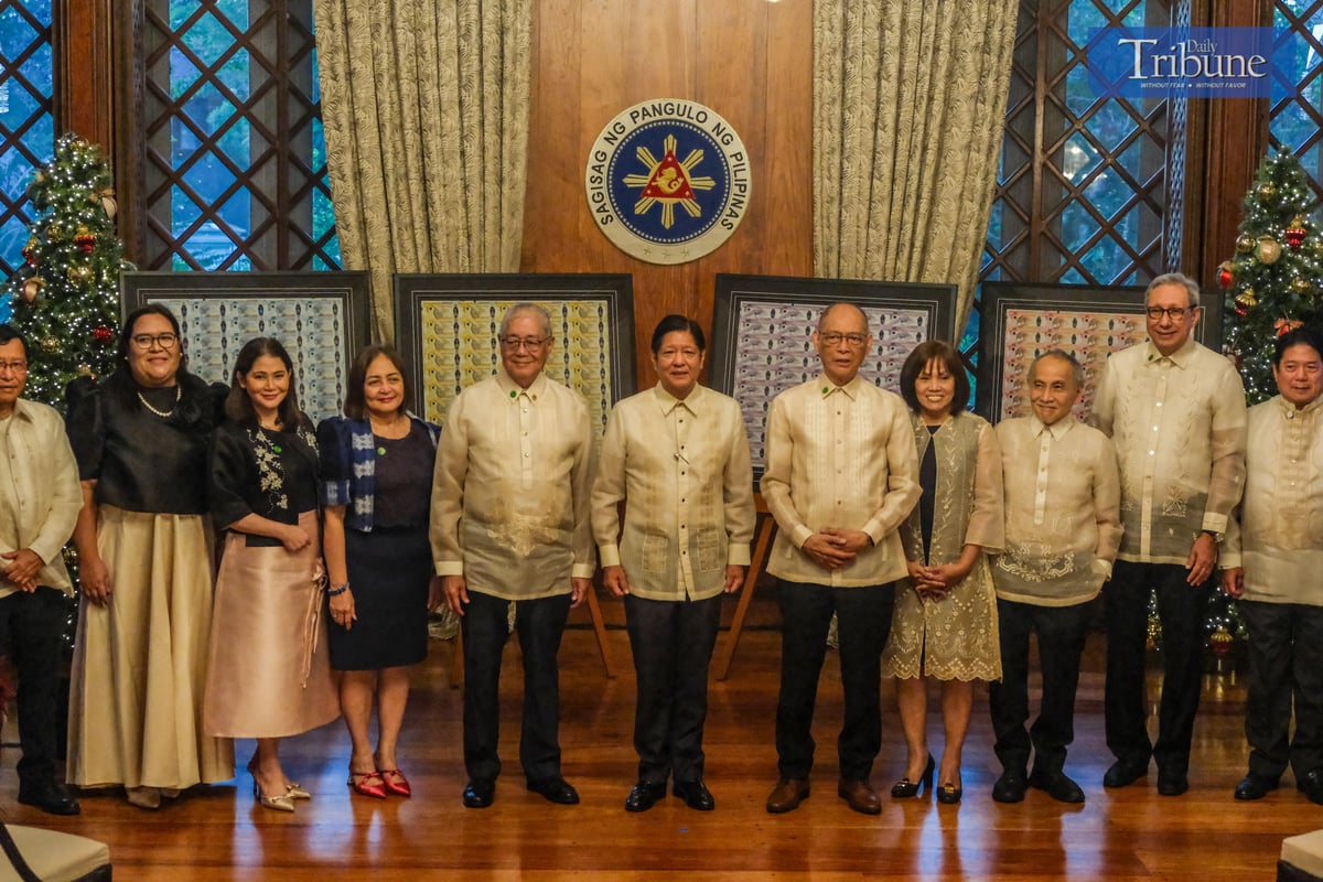 President Ferdinand Marcos Jr. (center) with BSP Governor Eli Remolona Jr. and BSP officials.