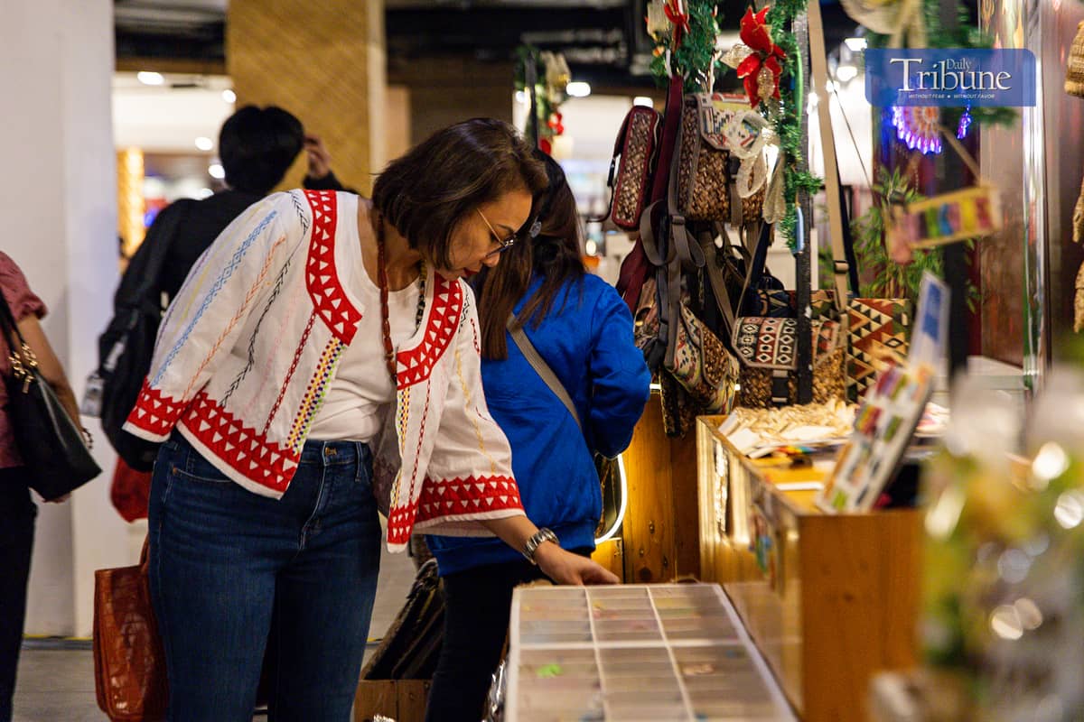 Department of Trade and Industry (DTI) Secretary Cristina Roque leads the launch of the third and final installment of DTI's Christmas Village Fair at Ayala Malls Manila Bay on Friday, 20 December 2024.