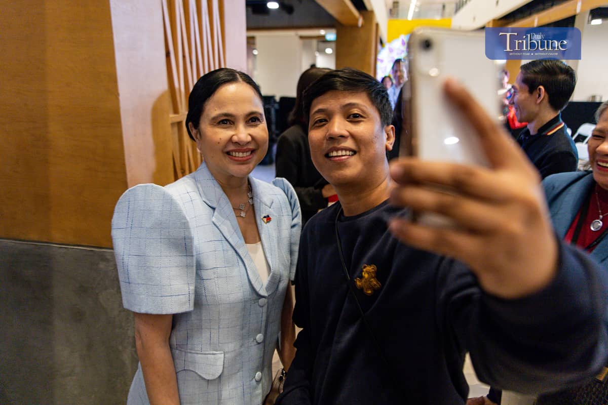 Department of Trade and Industry (DTI) Secretary Cristina Roque leads the launch of the third and final installment of DTI's Christmas Village Fair at Ayala Malls Manila Bay on Friday, 20 December 2024.