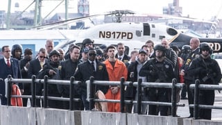 Suspect in health CEO killing faces murder charge