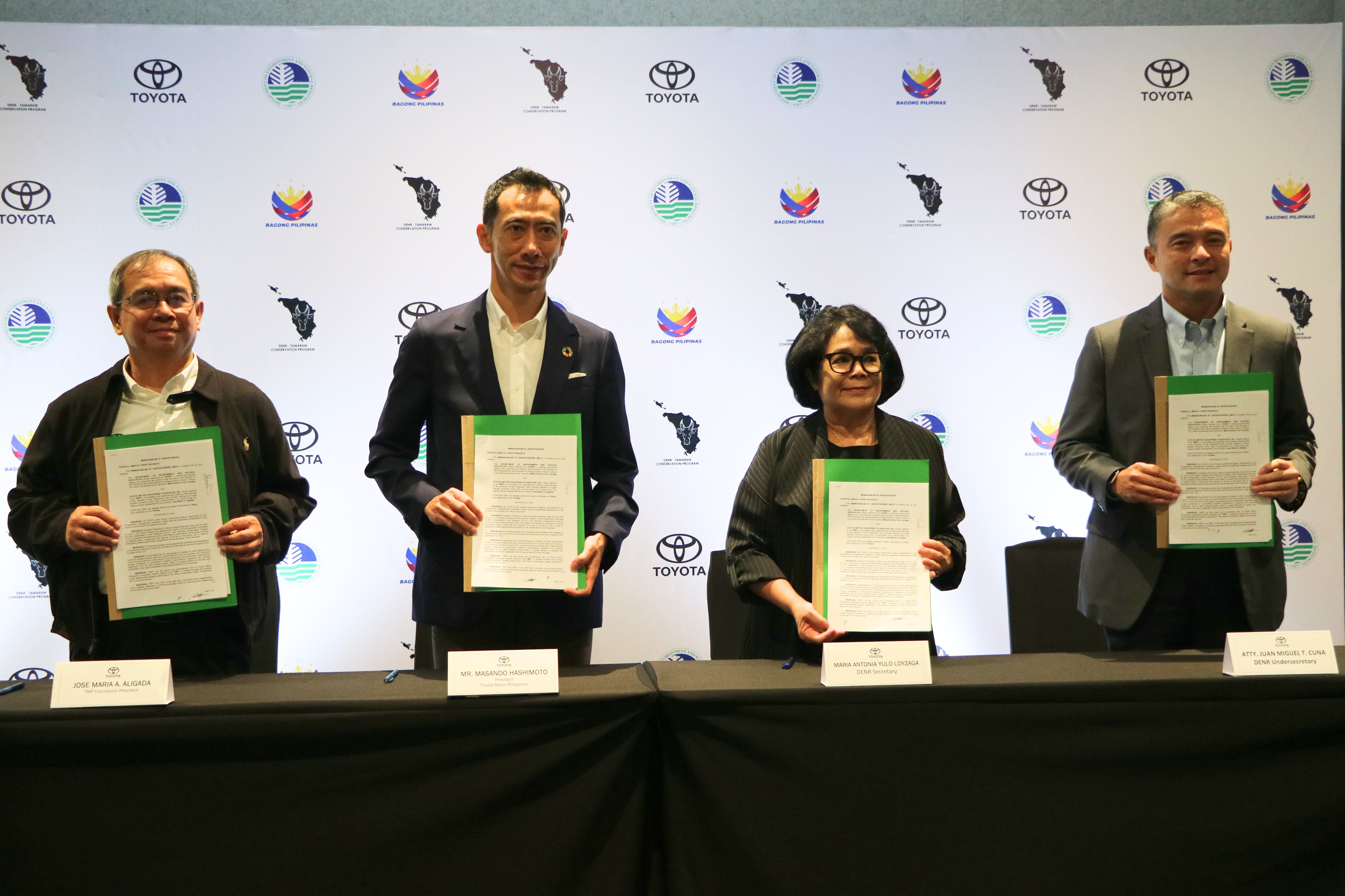 TOYOTA Motors Philippines and Department of Environment and Natural Resources executives make a collaborative move towards preserving the endangered tamaraw species. Shown are (from left) TMP Foundation president Jose Maria Aligada, TMP president Masando Hashimoto, DENR Secretary Maria Antonia Loyzaga and DENR Undersecretary Juan Miguel Cuna.
