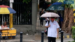 You can stand under my umbrella—rain showers sweep the Philippines, says Pagasa