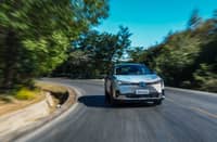 The GAC Emkoo Hybrid carves through winding roads with precision and elegance.