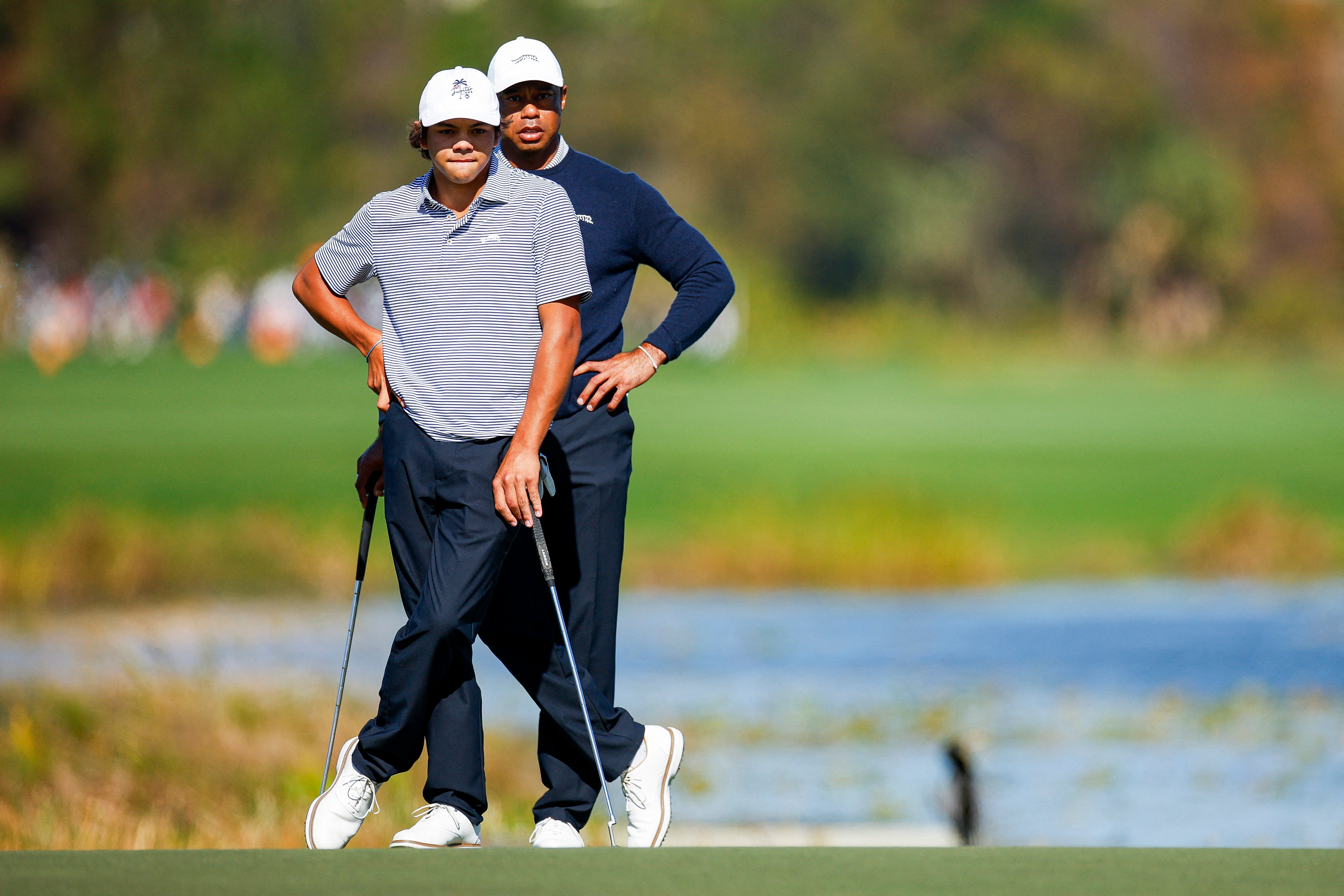 Tiger, son Charlie get lead share