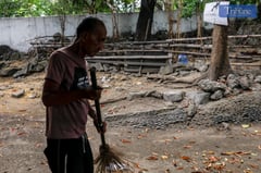 Sweeper in Manila's hidden park
