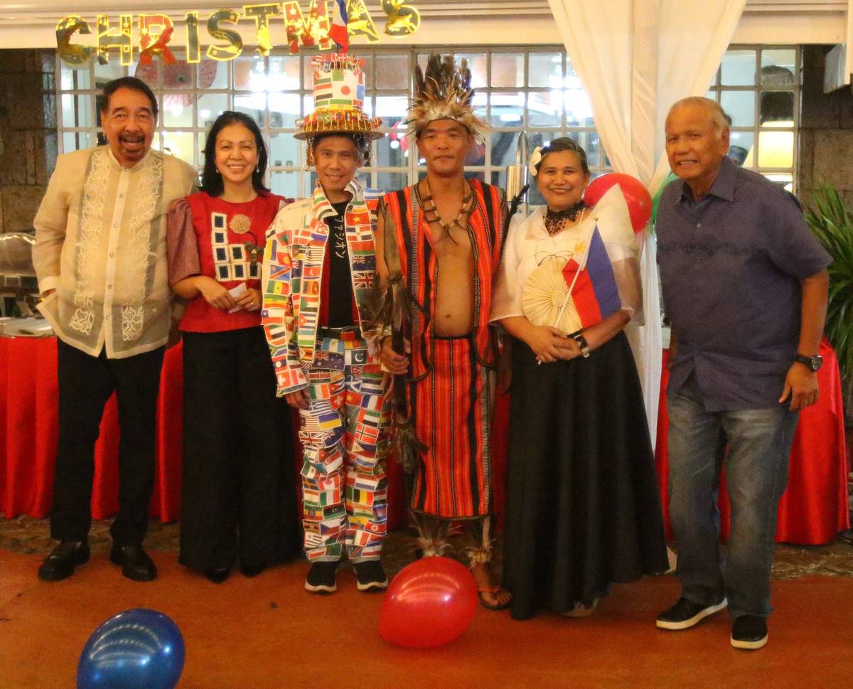 Daily Tribune executives with the costume contest winners Windsor Genova, Lorenz Dalit and Avic Clemente together with Bing Matoto.
