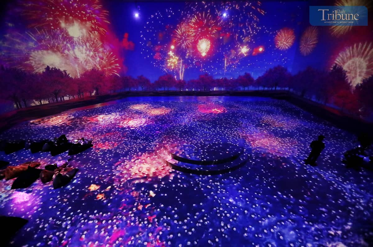 People enjoy their holiday break by exploring 3D art installations and festive Christmas displays at Art in Island, Quezon City, on Monday, 23 December 2024, just a day before Christmas Eve.