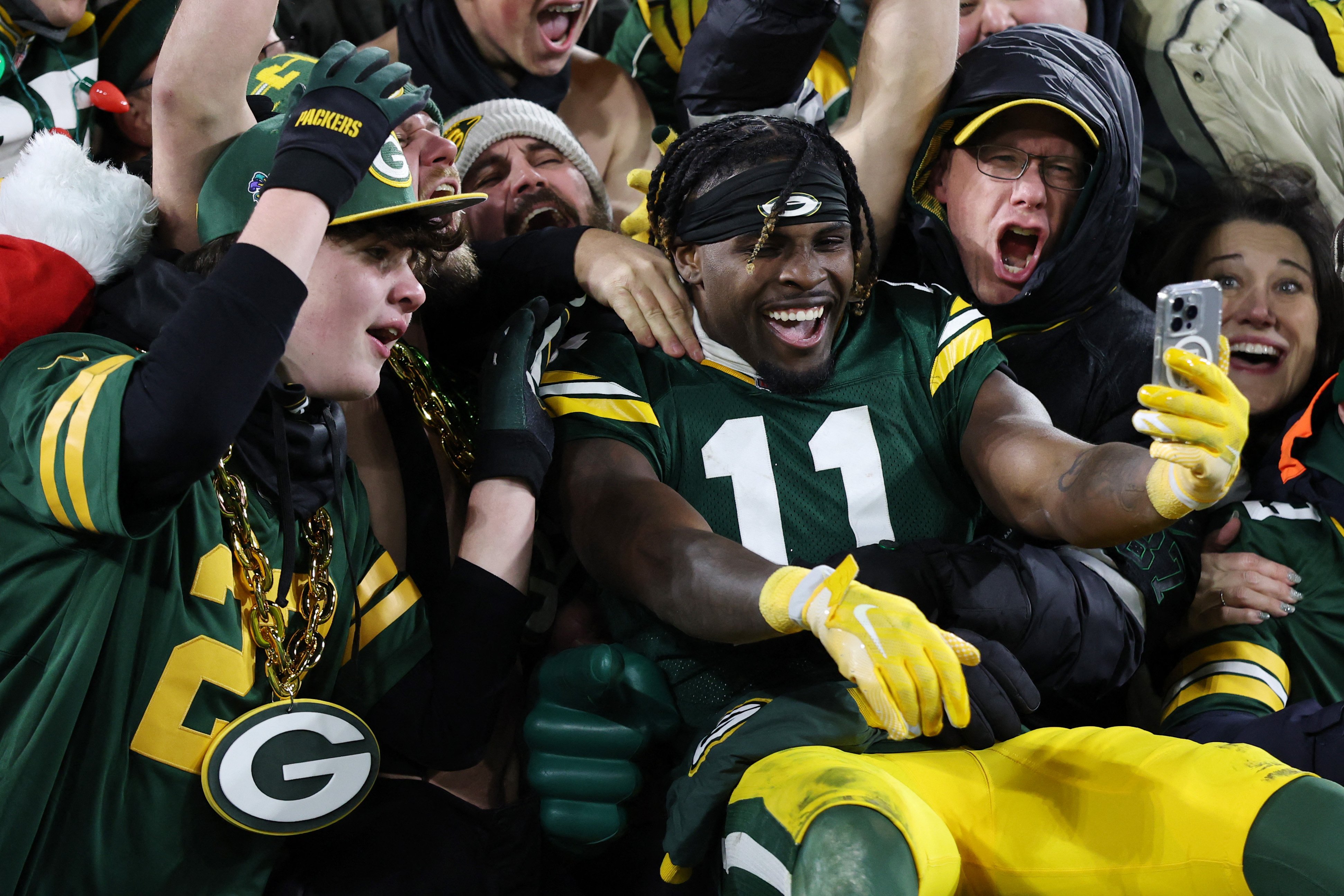 Jayden Reed #11 of the Green Bay Packers celebrates with fans after his team defeated the against the New Orleans Saints at Lambeau Field on December 23, 2024 in Green Bay, Wisconsin. Stacy Revere/Getty Images/AFP
Stacy Revere / GETTY IMAGES NORTH AMERICA / Getty Images via AFP