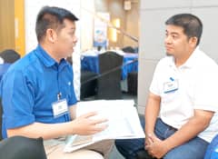 Free to do other things for his business. Joey De Villa (left), Team Head of BDO’s CMS-SME Business Development, explains to Perry Ong, Jr. how BDO CMS will improve the payroll system of Ong’s food manufacturing business.