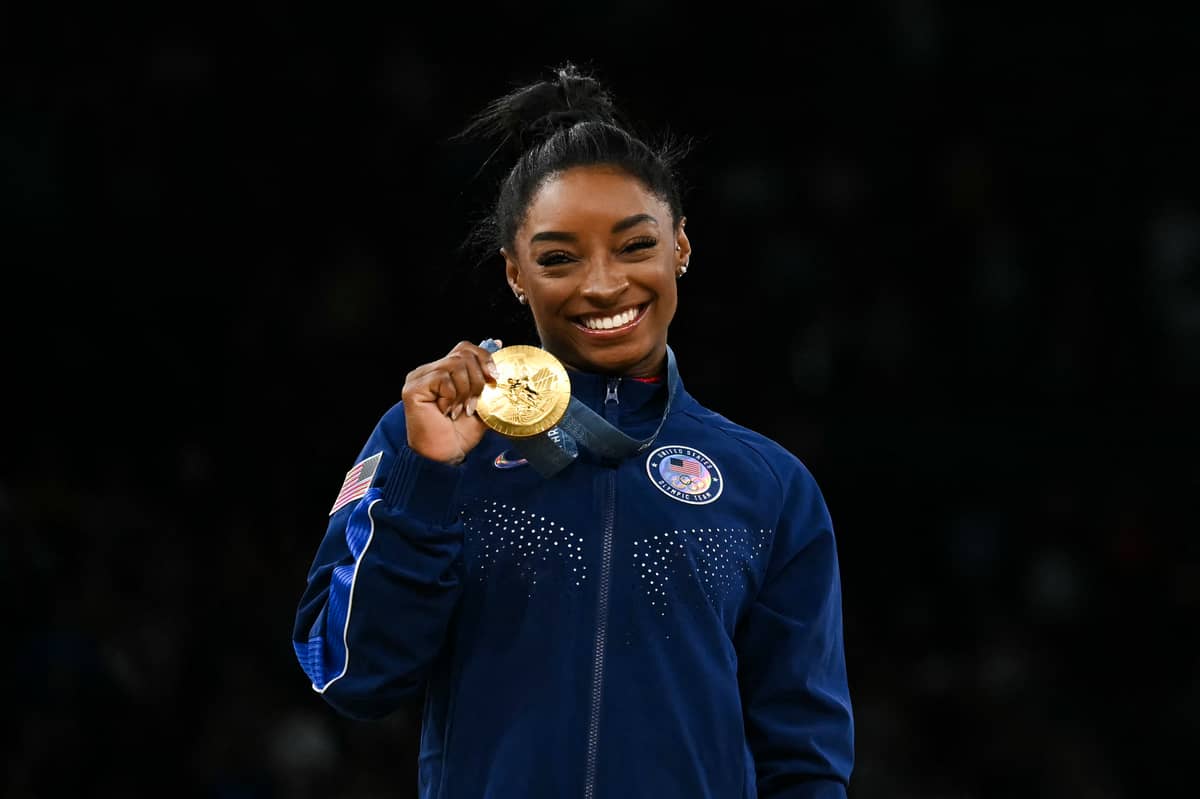 Simone Biles
celebrates after
winning in the vault
event of the Paris Olympics.