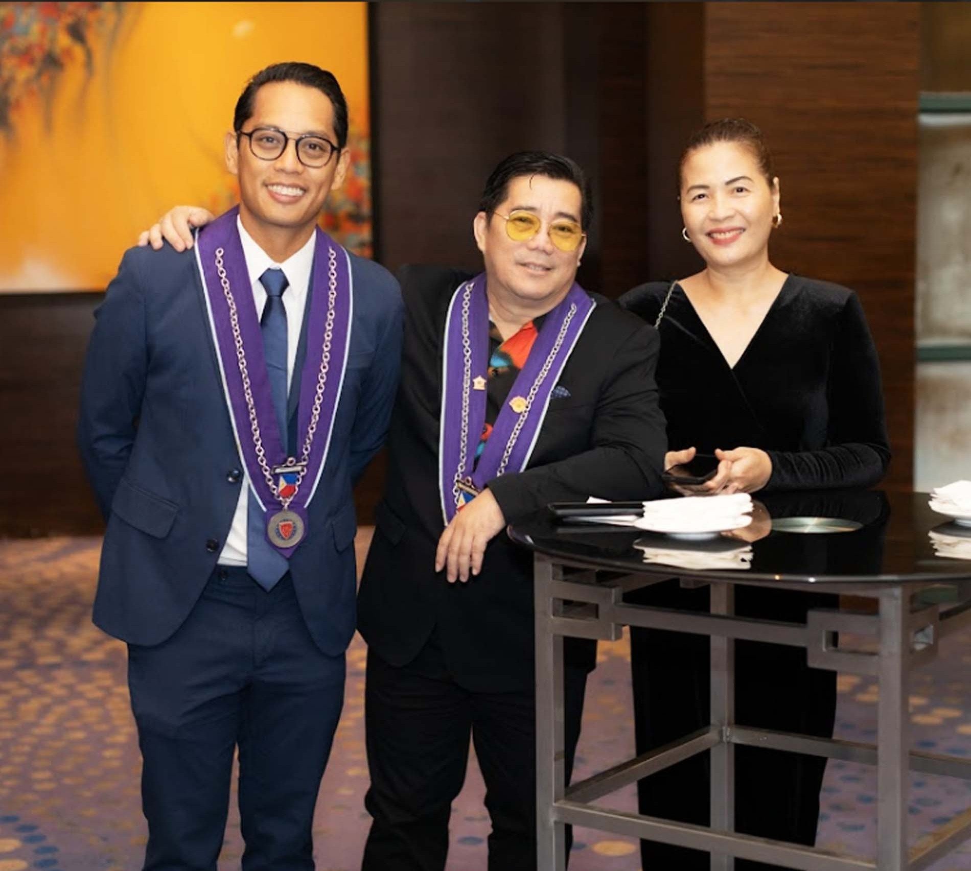 Darwin Cula with Jerome and Merlie Escalona.