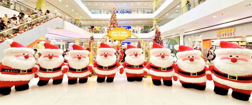 Snap photos with Santa during the Santa Squad Mascot Parade!