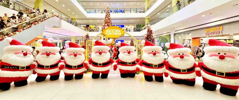 Snap photos with Santa during the Santa Squad Mascot Parade!
