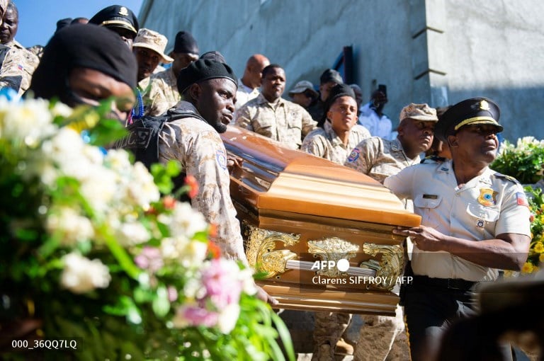 Two reporters, cop slain by Haiti gang