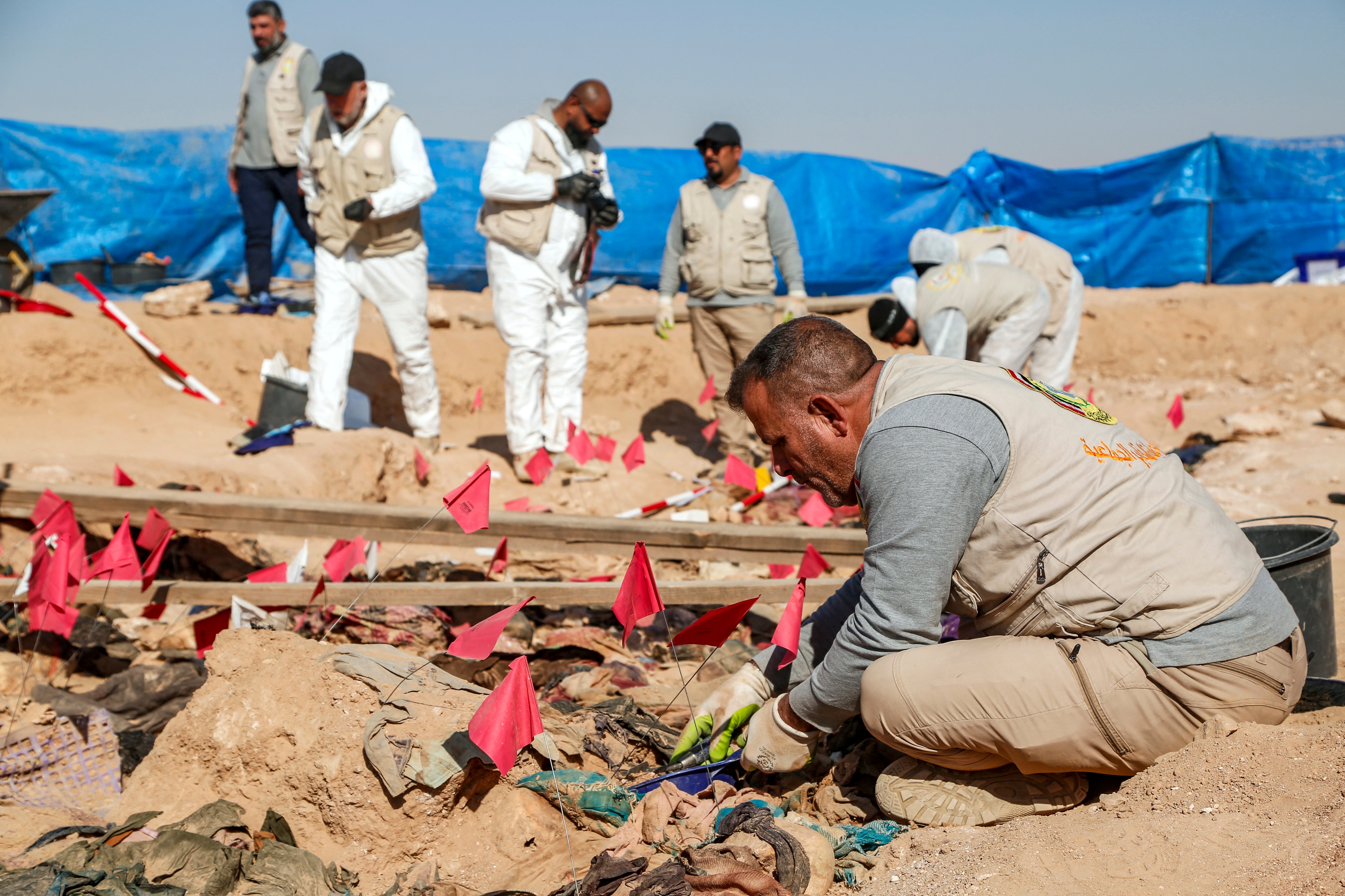 Bodies of about 100 Kurdish women, children found in Iraq mass grave