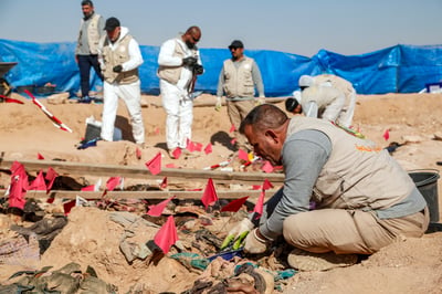 Bodies of about 100 Kurdish women, children found in Iraq mass grave