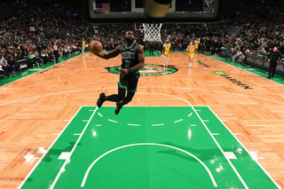 AERIAL ACROBAT: Brown displays dunking prowess as Celtics crush Pacers