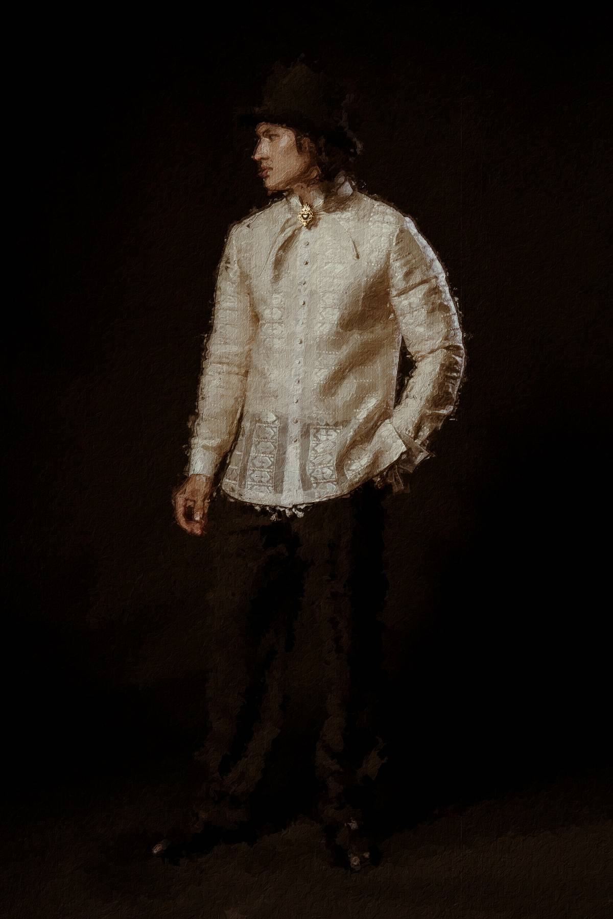 ILLUSTRADO. Sharuen Hafeel as a Filipino gentleman in the finest callado-ed and embroidered piña barong Tagalog paired with pinstripe pants and bespoke leather shoes and mixed with embroidered piña by Rafael Ebarle. It is worn with a scarf and top hat reminiscent of the colonial days of Filipino elite society.