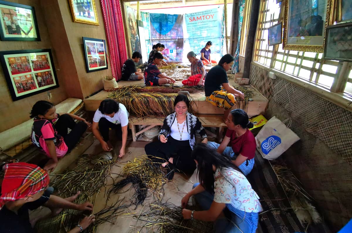 Mat weaving workshop for Blaan youth being supervised by Manlilikha ng Bayan Estelita Bantilan.