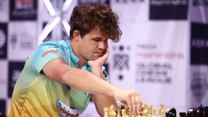 Magnus Carlsen opts to quit a championship event in New York after breaching dress protocol.