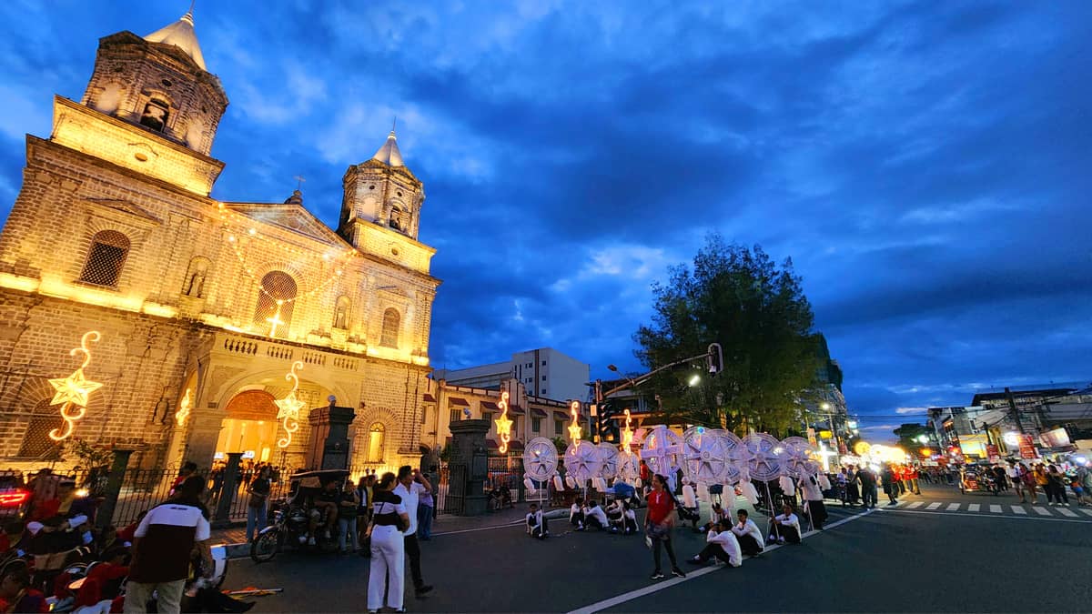 Participants from different barangays getting ready for the procession in front of the Holy Rosary Parish Church in Angeles City’s heritage district.