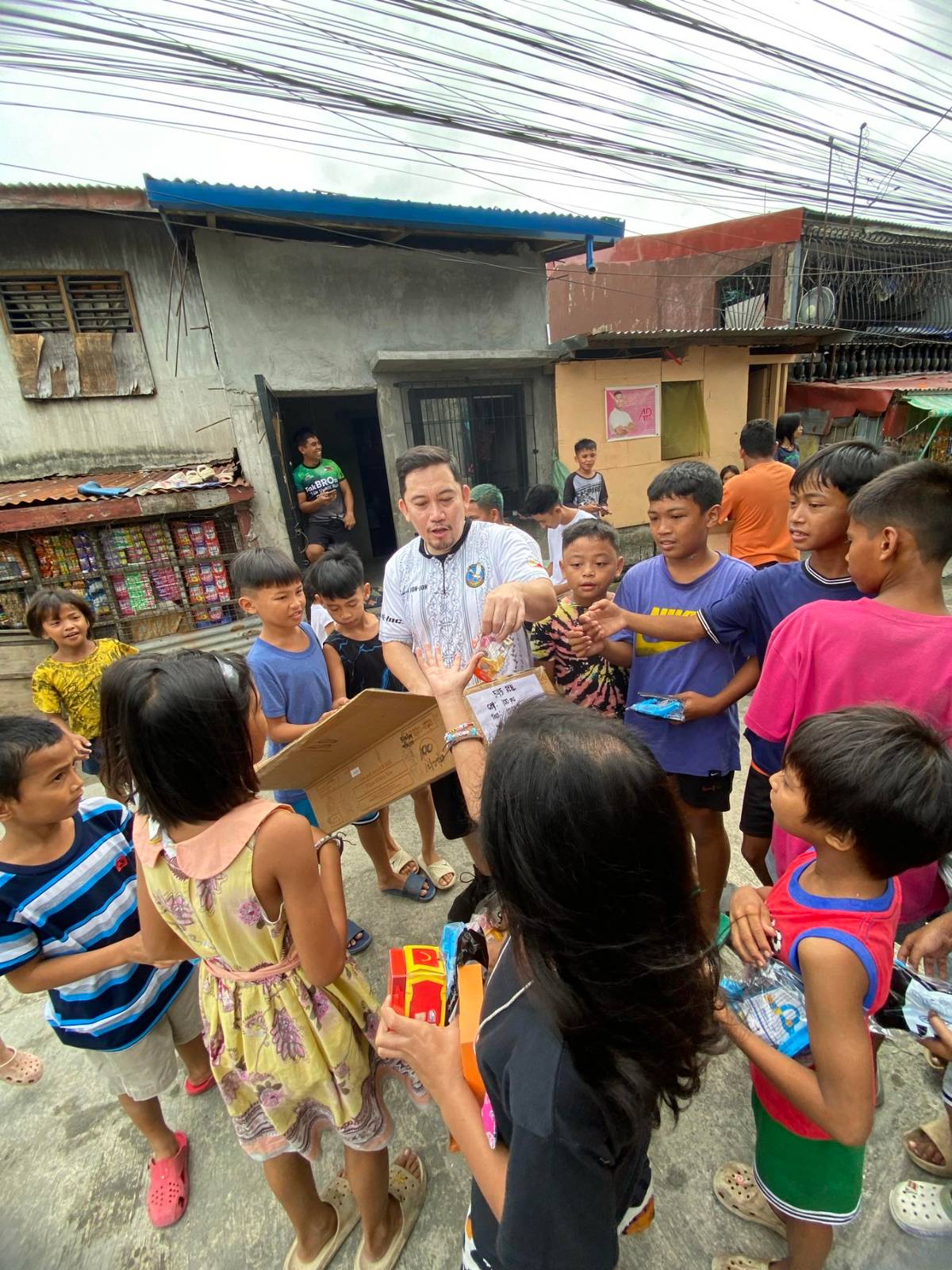 Children of Barangay Wawa in Balagtas, Bulacan receive Christmas presents.