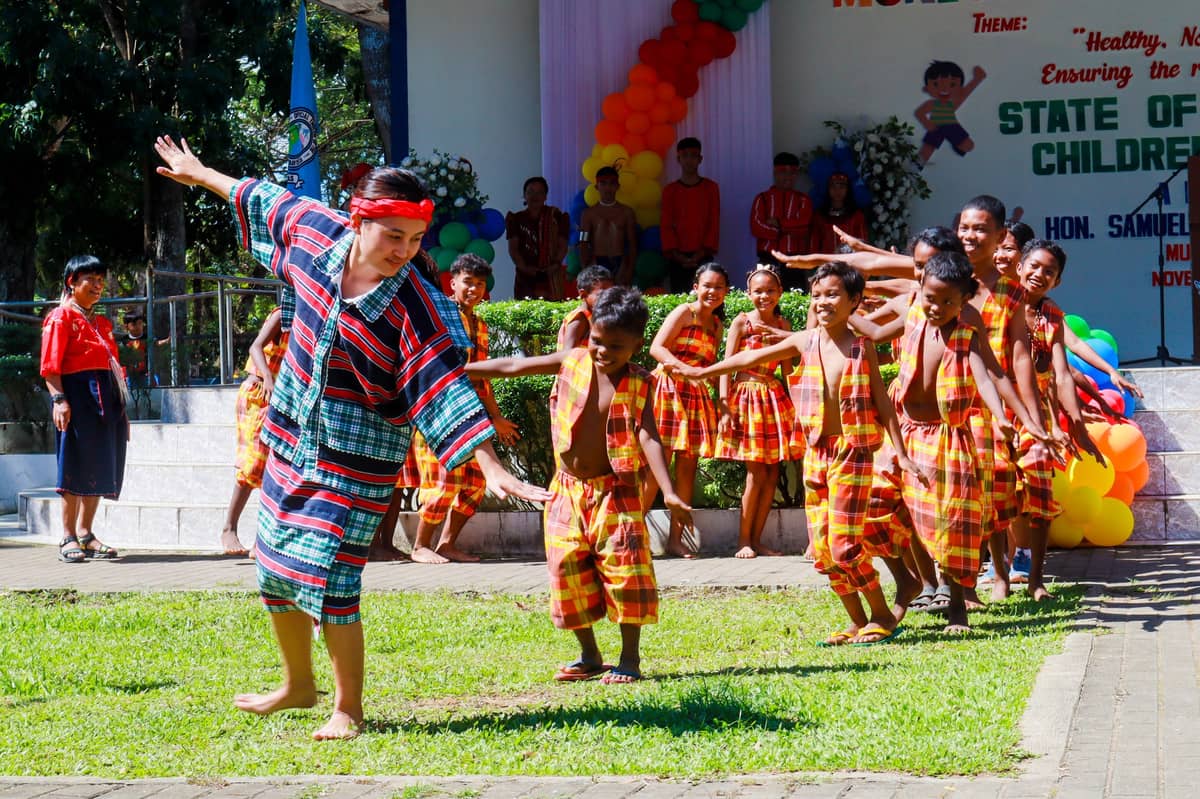 Ibaloy youth Arlene Ricardo leads the Ati kids in dancing tayaw in Buenavista, Guimaras.