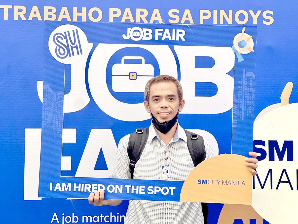 A successful applicant hired on the spot in one of SM Supermalls' Job Fairs, exemplifying their commitment to connecting Filipinos with job opportunities.