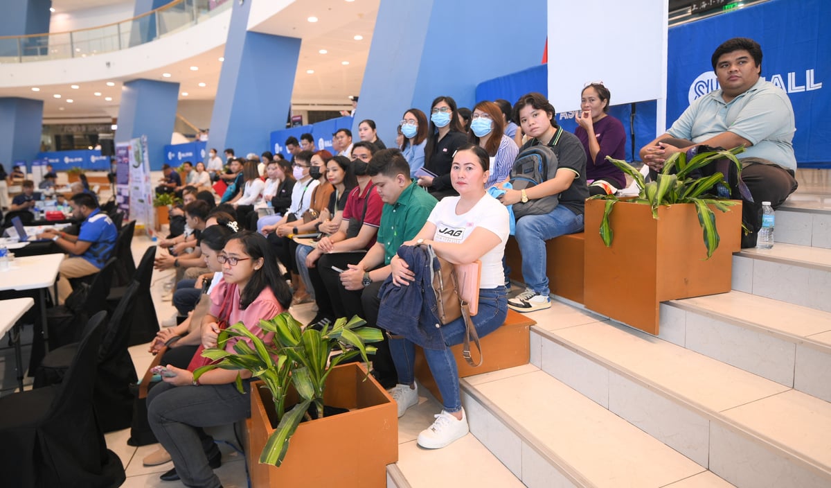 Displaced information technology (IT) workers seek new career beginnings at the Project DAPAT (Department of Labor and Employment (DOLE) Action Plan and Transition) Job Fair in SM Mall of Asia.