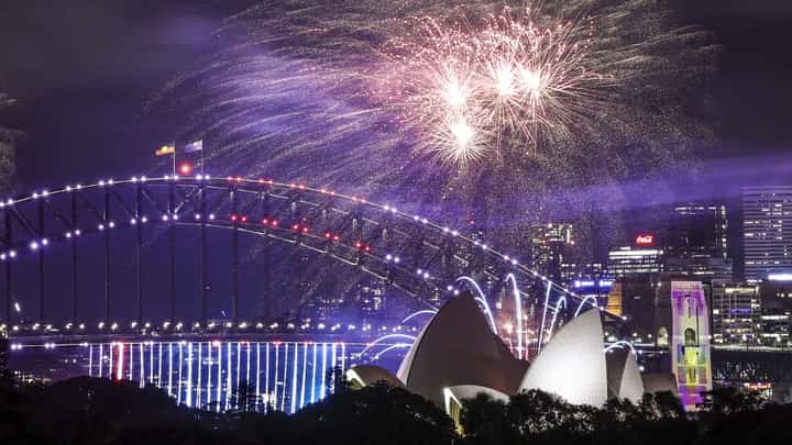 Fireworks light up the Sydney Harbor Bridge and Sydney Opera House during the early New Year’s Eve celebrations in Sydney on 31 December, 2024.
