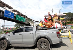 Devotee prepares Black Nazarene replica for blessing