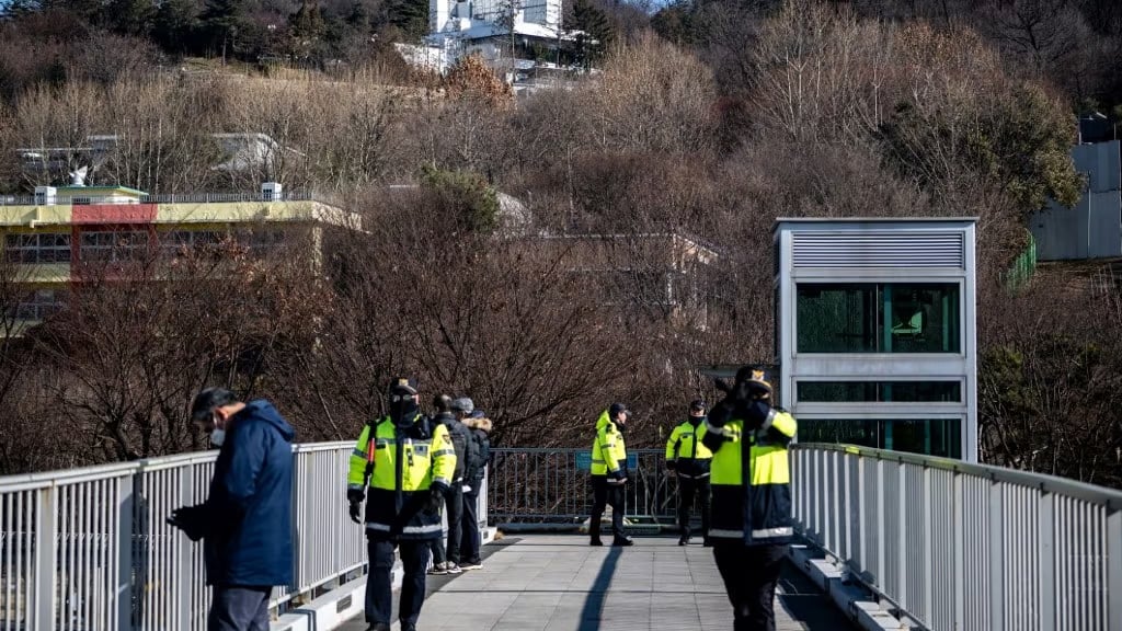 South Korea’s impeached president resists arrest 