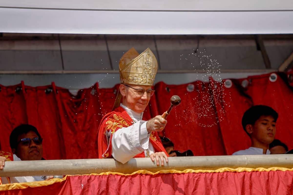 Papal Nuncio Most Reverend Charles John Brown blessing the replica figures.