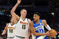 Milwaukee's Giannis Antetokounmpo, right, and Denver's Nikola Jokic, left, were the top vote-getters in the first ballot report on fan voting for next month's NBA All-Star Game