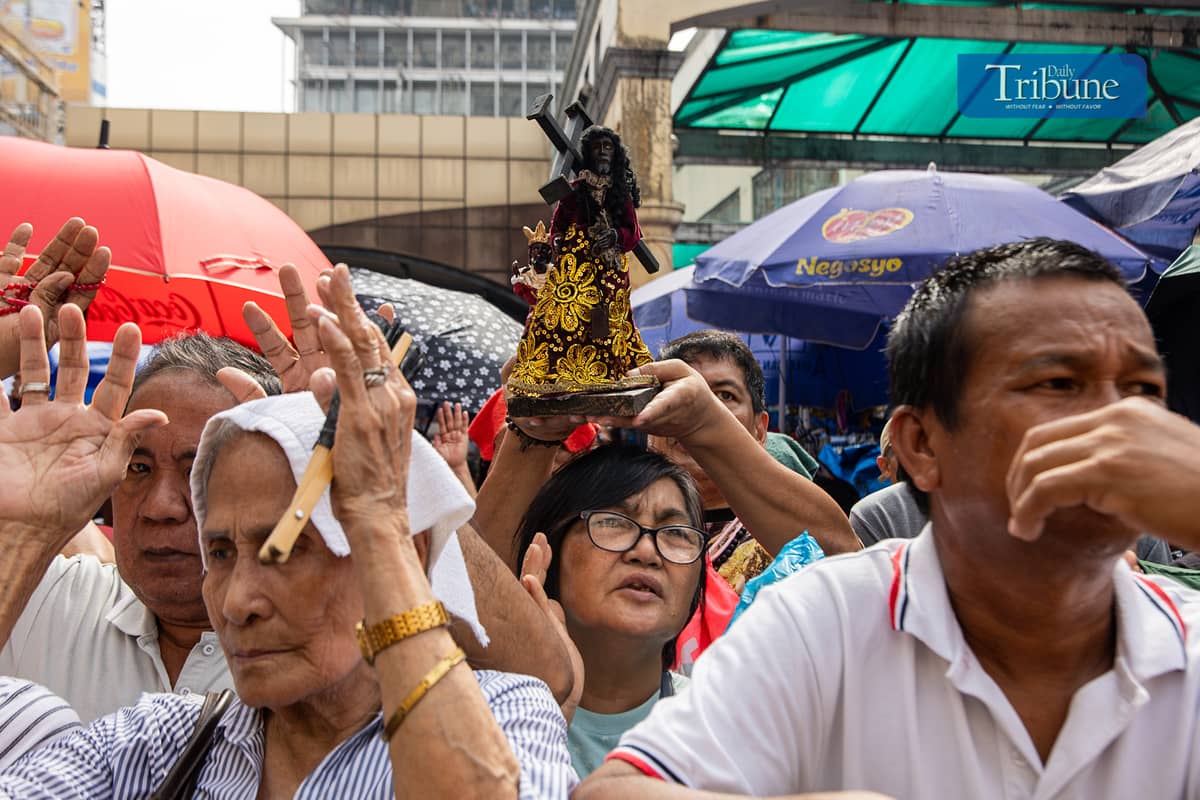 Catholic devotees gather at the Minor Basilica and National Shrine of Jesus Nazareno in Quiapo, Manila, for the first Friday Mass of the year on Friday, after a blessing ceremony for replicas of the Black Nazarene was held on Thursday, 2 January 2025.