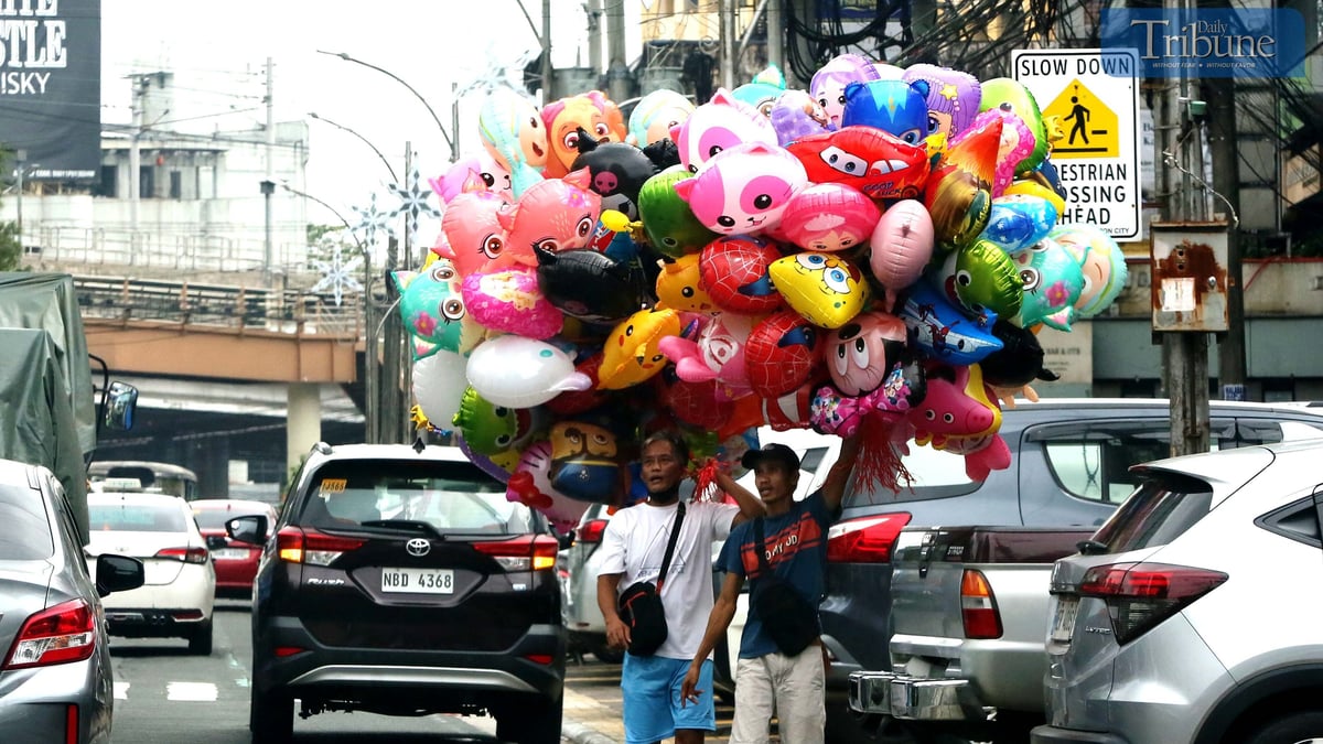 Colorful balloons brighten Timog Avenue