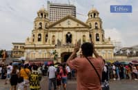 (FILE) Catholic devotees gather at the Minor Basilica and National Shrine of Jesus Nazareno in Quiapo, Manila, for the first Friday Mass of the year on Friday. On Thursday, 2 January 2025, a blessing ceremony was held for replicas of the Black Nazarene. With the Traslacion fast approaching on 9 January, many attendees are also preparing for the annual procession honoring the Black Nazarene.
