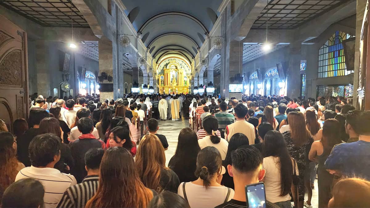 Parishioners attend the Misa de Gallo at the Our Lady of Grace Parish Church, known for its pastoleras.