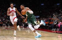 Giannis Antetokounmpo drops his fourth triple-double of the season to lift the Milwaukee Bucks to a 128-104 win over the Toronto Raptors in the NBA regular season.