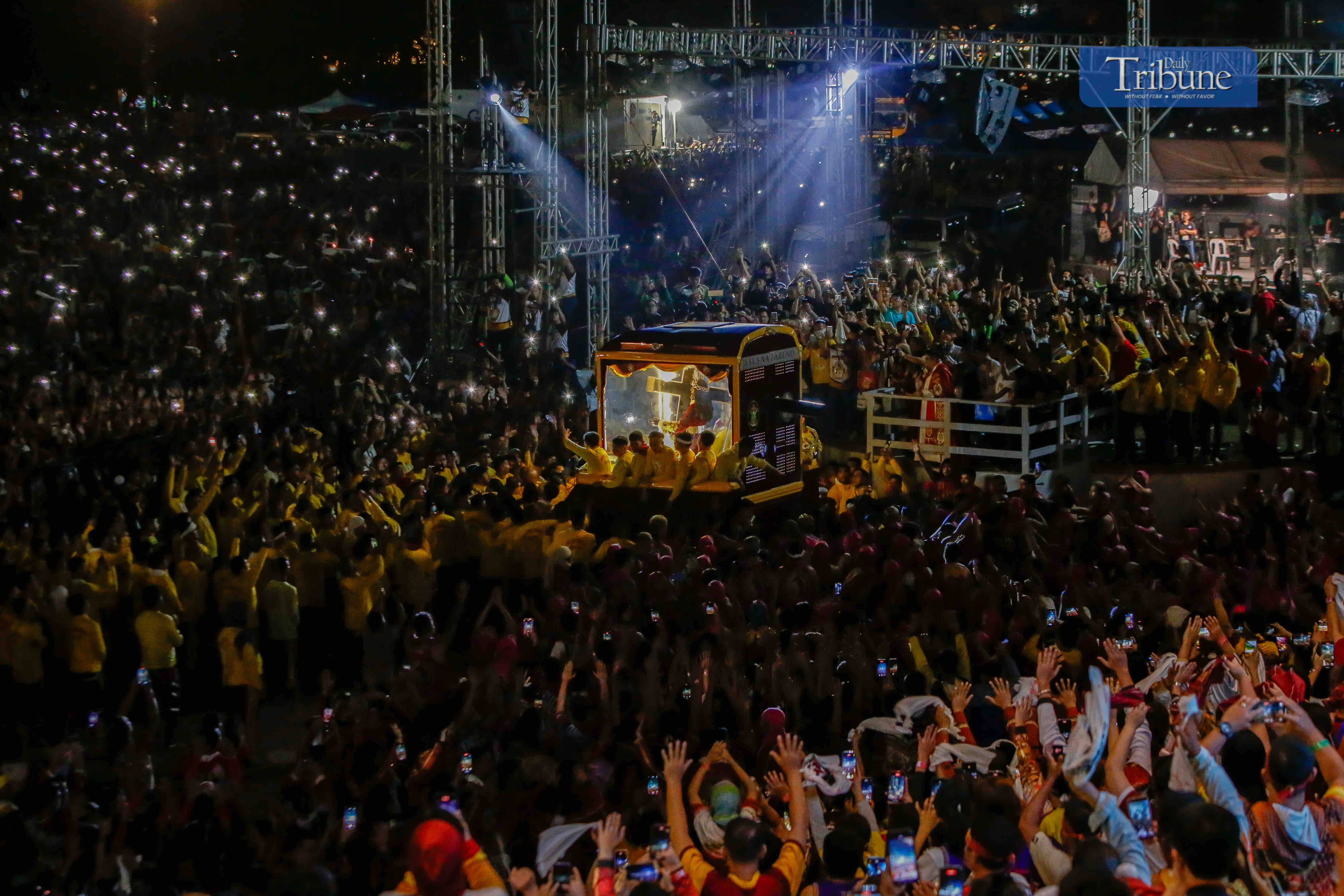 Crowds throng Manila streets as Jesus statue paraded