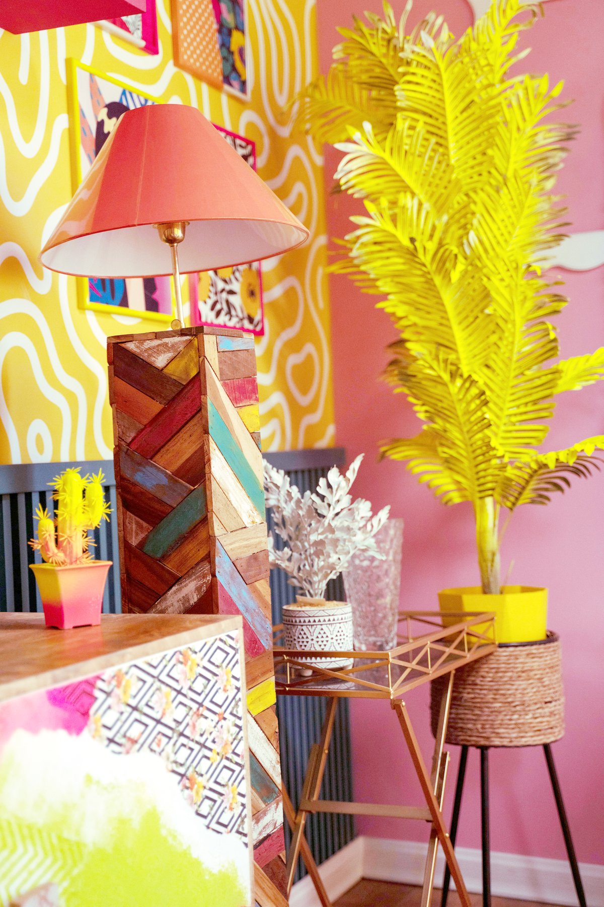 MAXIMALISM in full display.This vibrant corner layers bold patterns, eclectic textures, and saturated colors, creating a playful yet cohesive aesthetic. With its mix of rustic wood, retro accents, and lively décor, it embodies the Art of Curated Chaos, inviting personality and creativity into your space.