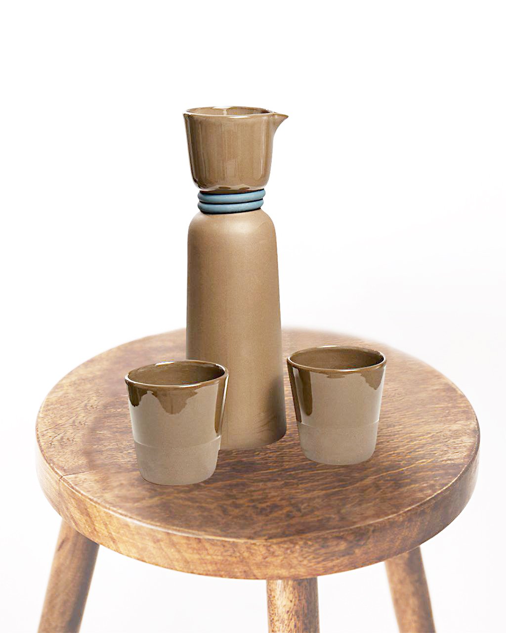 Clay Brown Umbra Carafe set and Sabang Wooden Mirror Frame bring Mocha Mousse elegance to your space with Filipino craftsmanship and functional design.