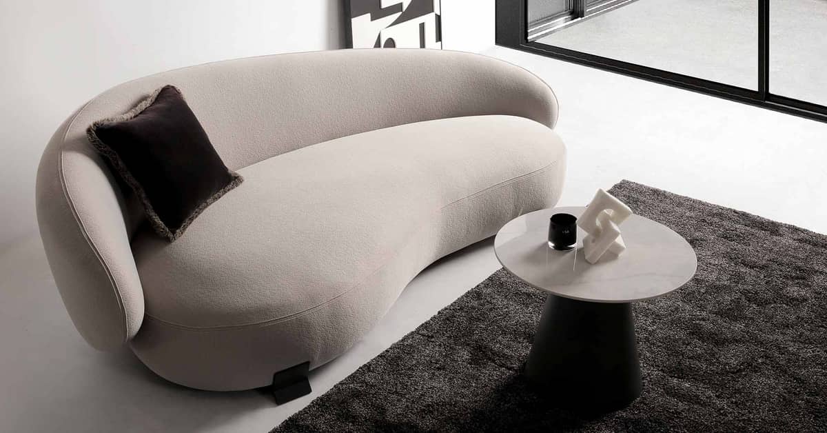 For 2025, kidney-shaped three-seater sofas will be all the rage.