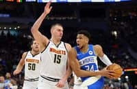 Giannis Antetokounmpo of the Milwaukee Bucks (right) and Nikola Jokic of the Denver Nuggets remain ahead in the NBA All-Star voting.