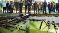 Former rebs surrender firearms, pledge to rebuild lives