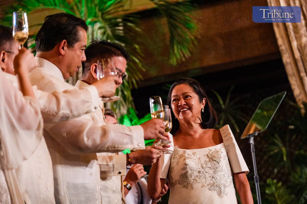 First Lady Liza Araneta-Marcos raises a toast with House Speaker Martin Romualdez and other distinguished guests during the Vin d'Honneur at Malacañan Palace on 11 January, 2025.