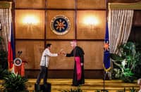 President Ferdinand "Bongbong" Marcos Jr. and Apostolic Nuncio to the Philippines Archbishop Charles Brown share a toast during the Vin d'Honneur for government officials and the diplomatic corps at Malacañan Palace on 11 January, 2025.