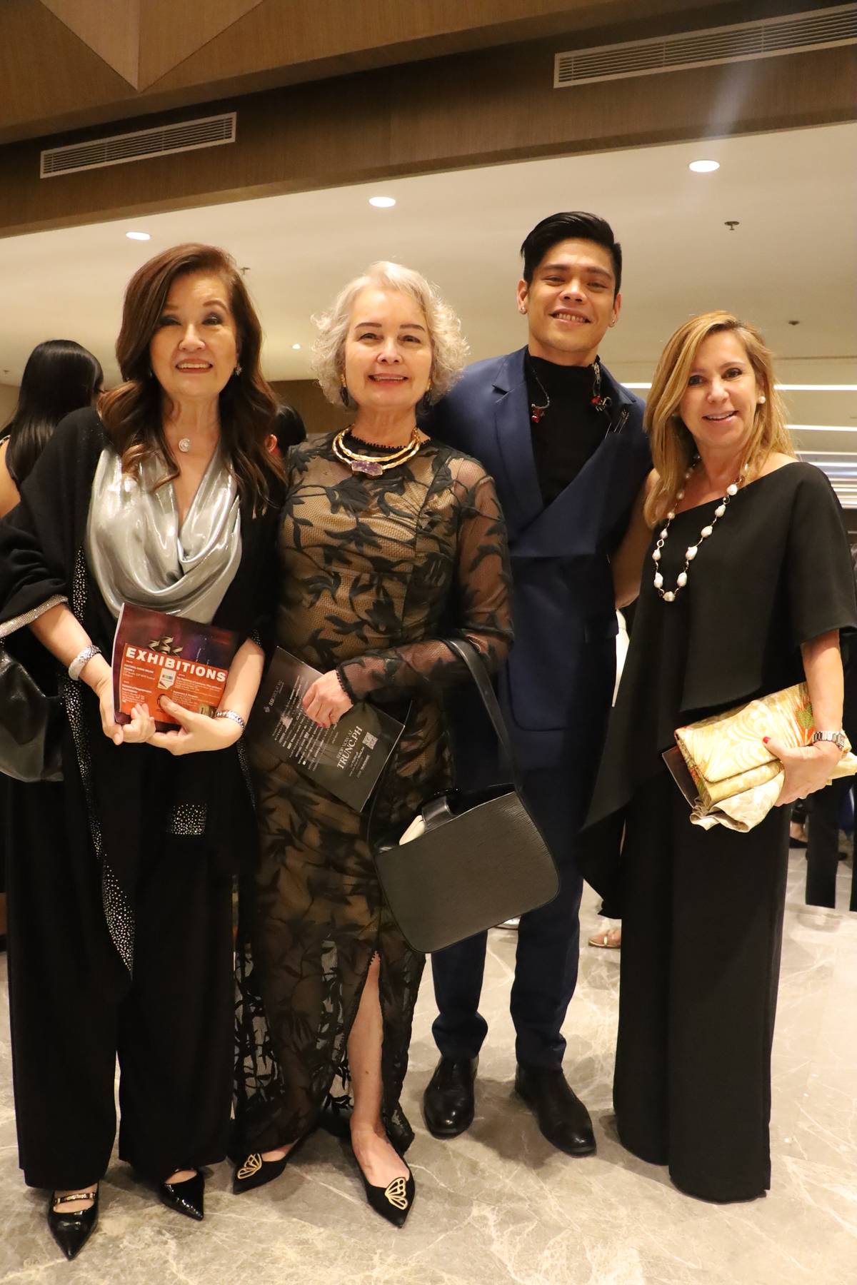Cora Dee Corpuz, PPOSI president Margie Moran Floirendo, performer Arman Ferrer, and Sandy Lamb Moran.