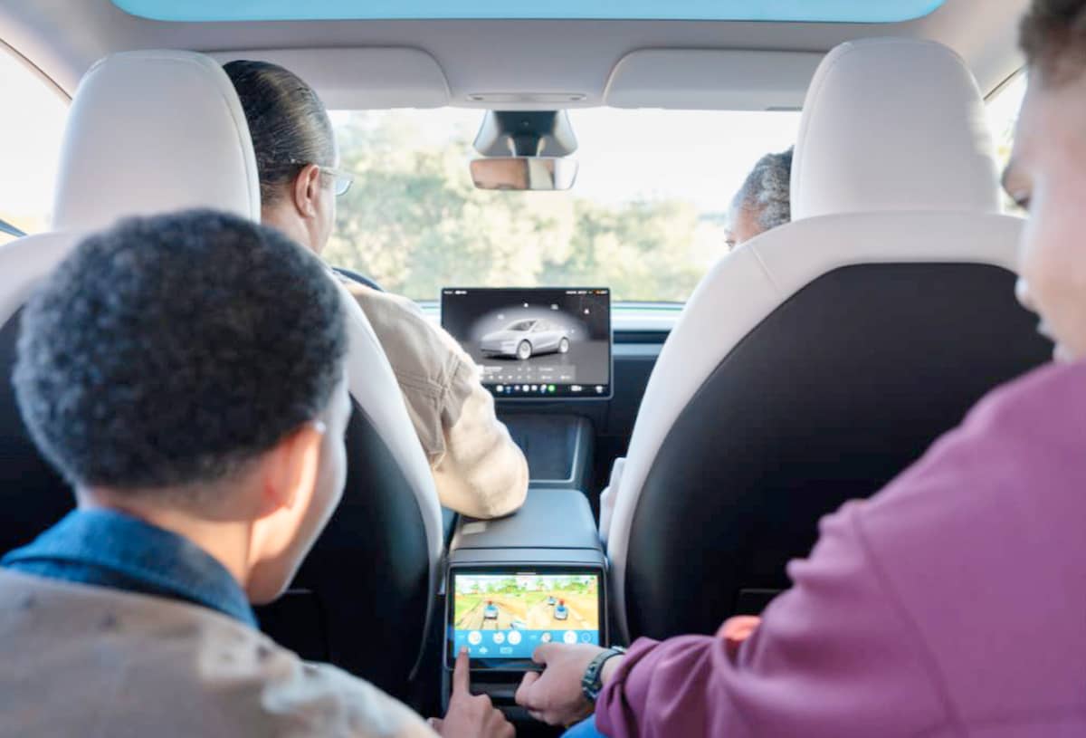 REAR passengers enjoy an upgraded experience with the second-row display and power-adjustable seats, making every journey comfortable and entertaining.
